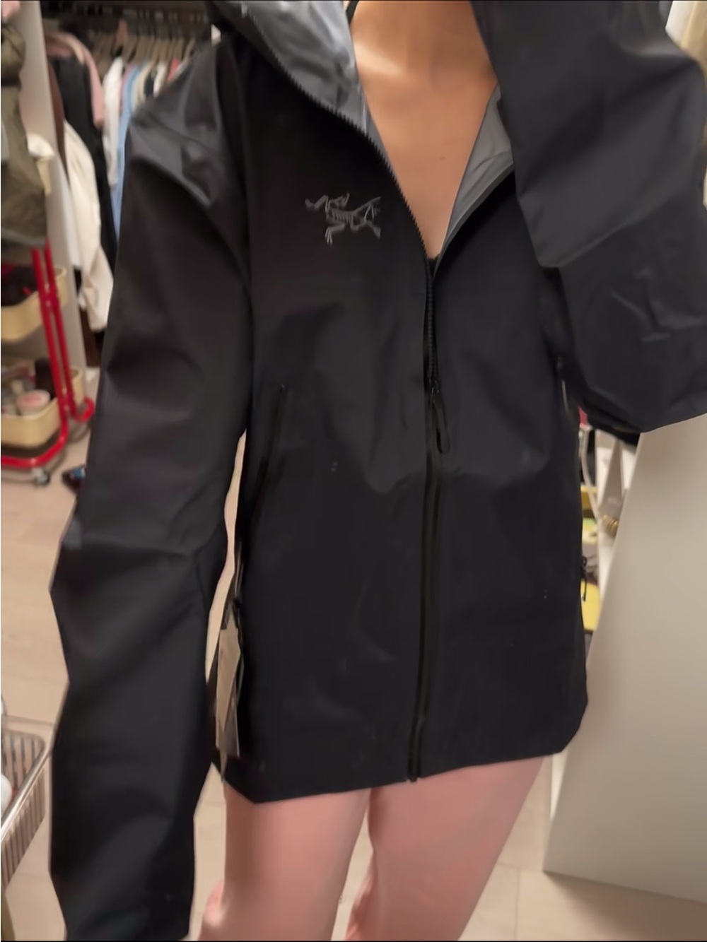 Arc'teryx Black Hooded Raincoat with Zip Pockets